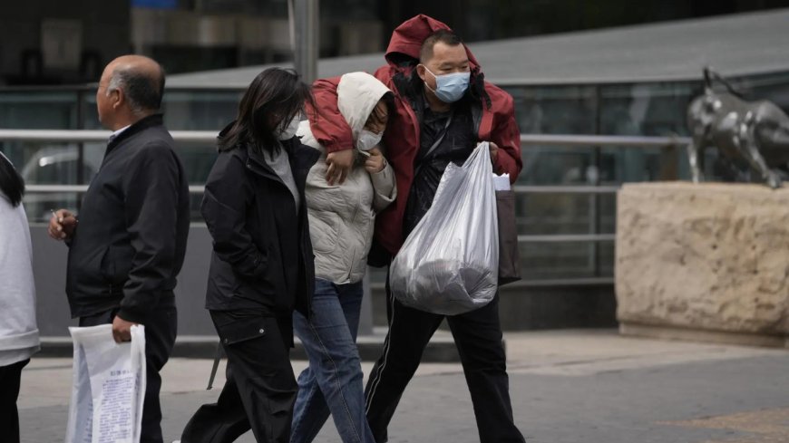 Hundreds of flights and trains cancelled in Beijing as high winds and sandstorms hit China